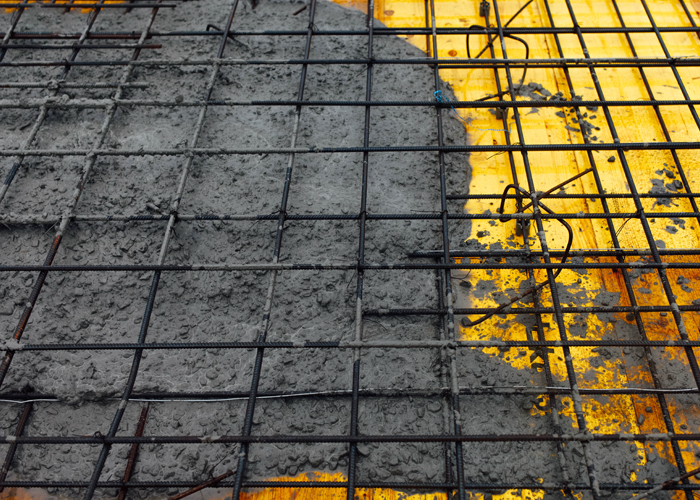 How does a cement and TMT bar-made structure become strong?